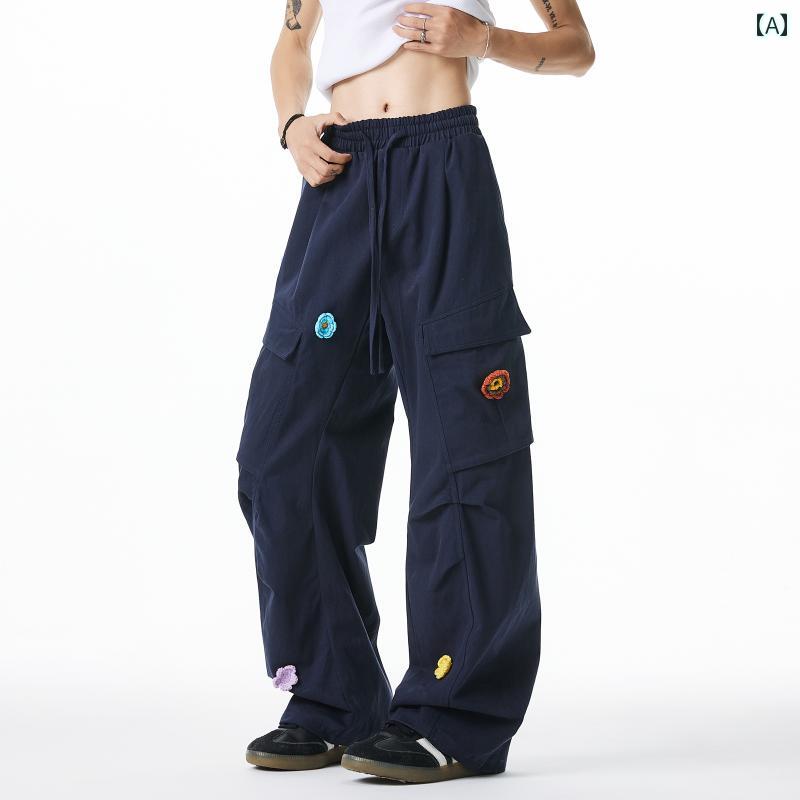 カーゴパンツ　メンズ　レディース 春に メンズ レディース向け 花柄の 刺繍が 施 パラシュートパンツと ワイド レッグの カジュアル パンツを 組み合わせた TIRED アメリカンの オーバー オー