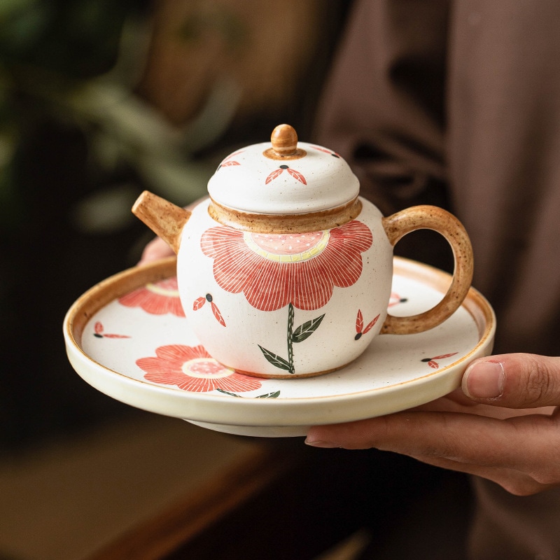 来客用のお茶を入れるための粉末彫刻入り陶器ティーポット手持ち式のシングルポットやけど防止の高級ティーポット