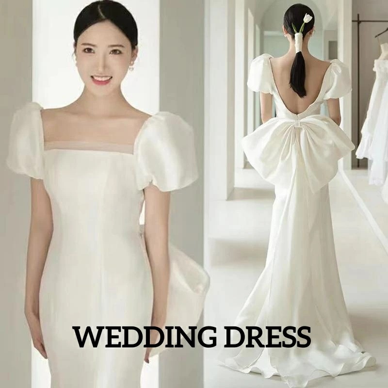 新品登場 花嫁ドレス エレガント ウェディングドレス ホワイト ロングドレス 上品 きれいめ 無地 高級感 結婚式 撮影 前撮り 後撮り 露背 ファスナー 礼服 トレーン 着痩せ パフスリーブ リボン 5,207円