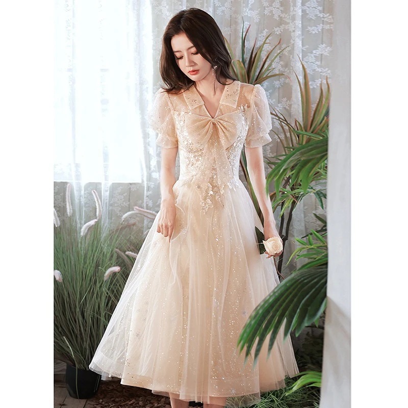 女性用シャンパンカラーの小さなイブニングドレス2024夏の気質高級ホストドレス宴会ドレス