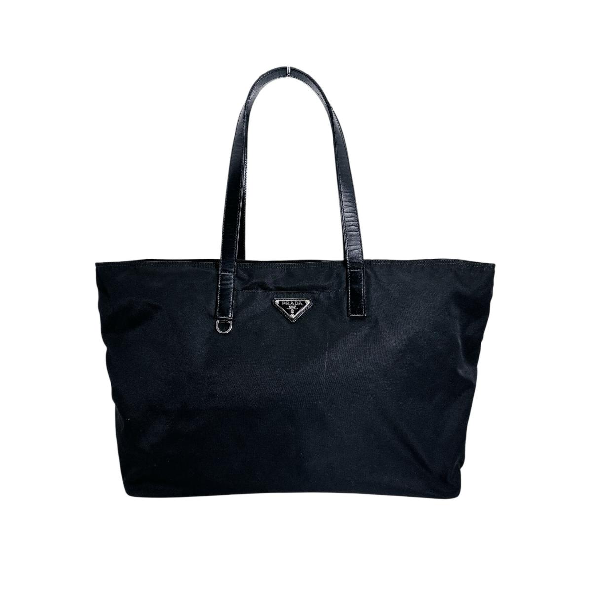 トライアングルロゴ ハンドバッグ ブラック 25,404円