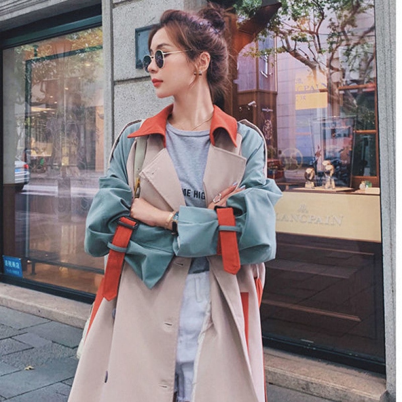 コントラストカラーのウインドブレーカーの女性のミッドレングス英国スタイル 2025 秋の新しい韓国スタイルのルーズコート女性のためのコート