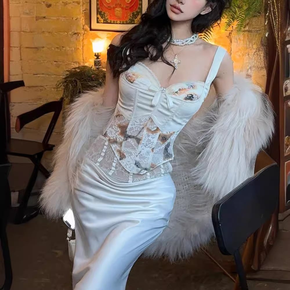 曲線美とセクシーさを兼ね備えた洗練されたヨーロッパとアメリカのスタイルのスリムフィットプリントサスペンダーボディコンパンツとスカートのツーピースセット