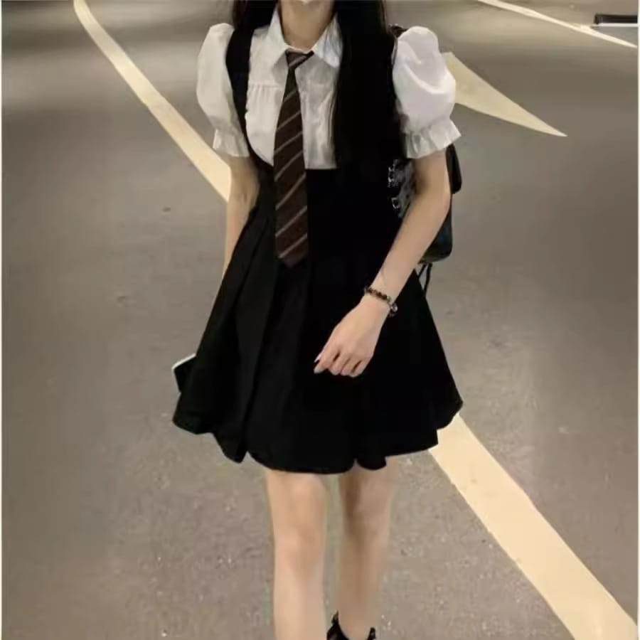 【1つ買うと10つ無料】Jkユニフォームパフスリーブシャツ +スリングプリーツスカートセットスモールブラックスカートドレス女性の夏