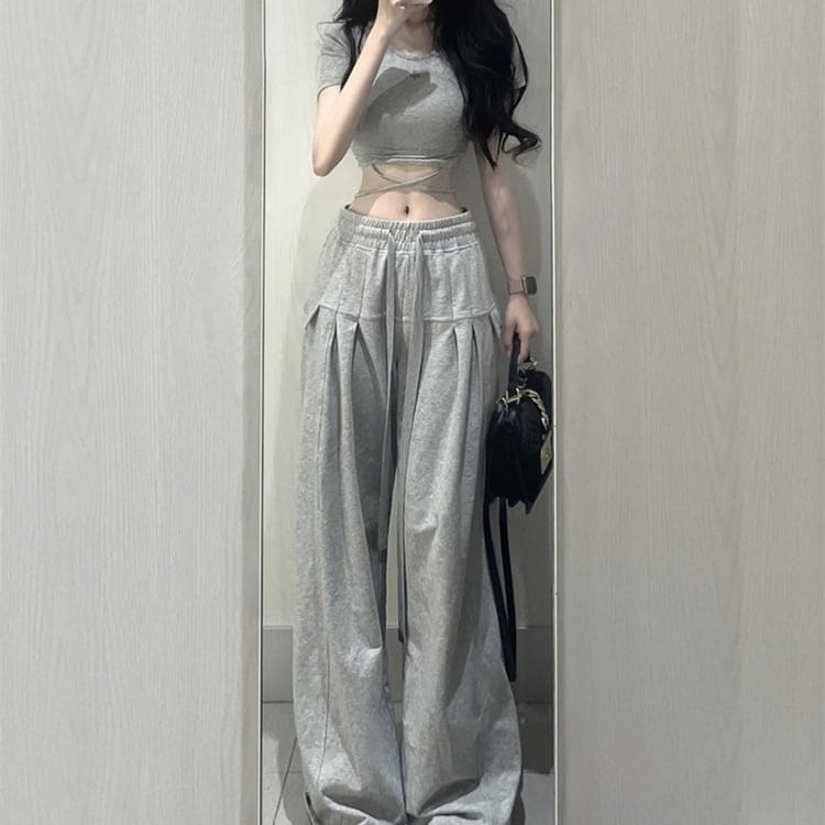 【2点セット】 上下セット セットアップ カットソー 半袖 ラウンドネック タイト ショート丈 クロスデザイン ロングパンツ ワイドパンツ ウエストゴム かわいい 大人可愛い きれいめ シンプル おし