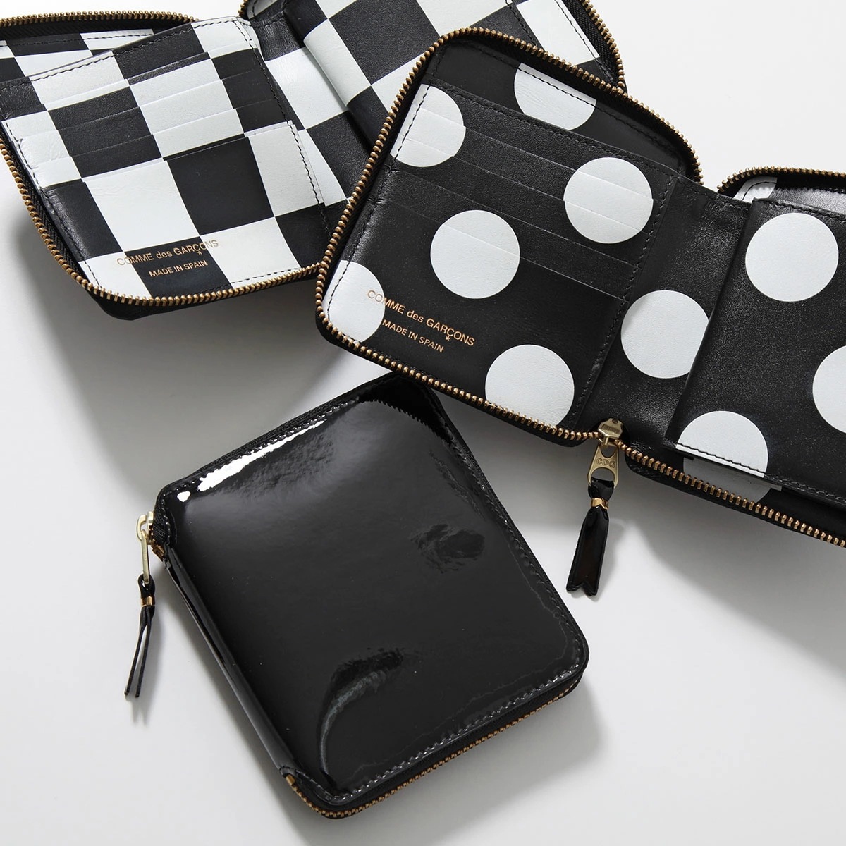 COMME des GARCONS コムデギャルソン 二つ折り財布 GLOSSY PRINT SA2100GP メンズ ラウンドファスナー 小銭入れあり チェック ポルカドット パテントレザー 29,069円