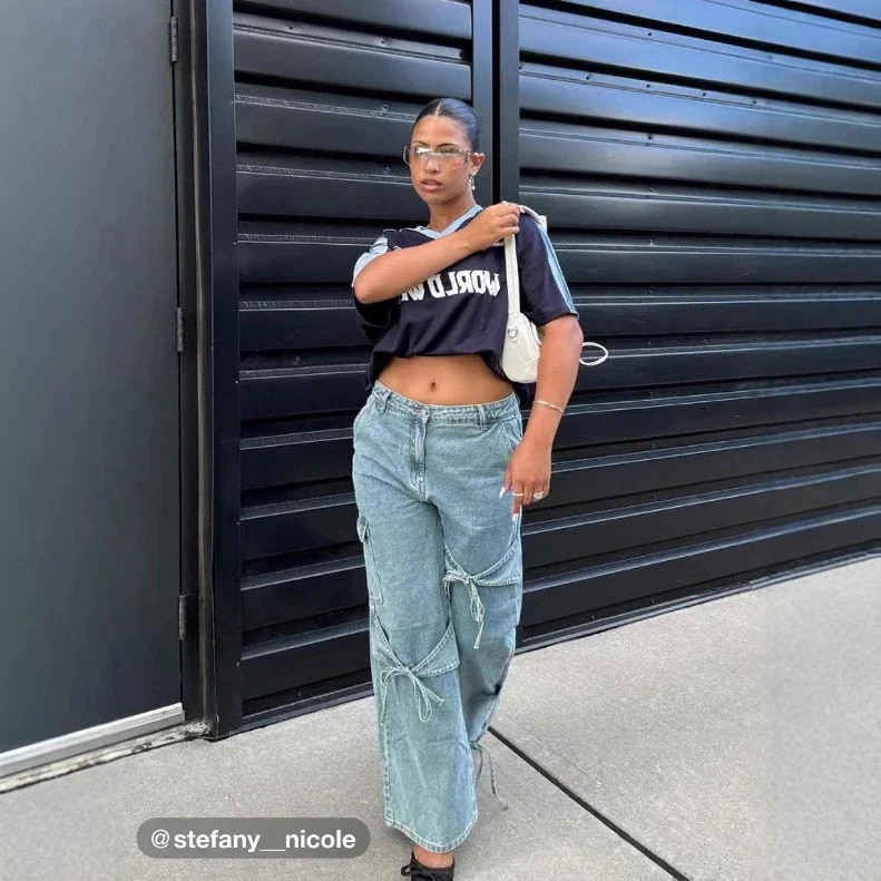 ヨーロッパとアメリカの弓ストラップデザインジーンズストリートホットガールズスタイルワイドレッグパンツルーズズボン