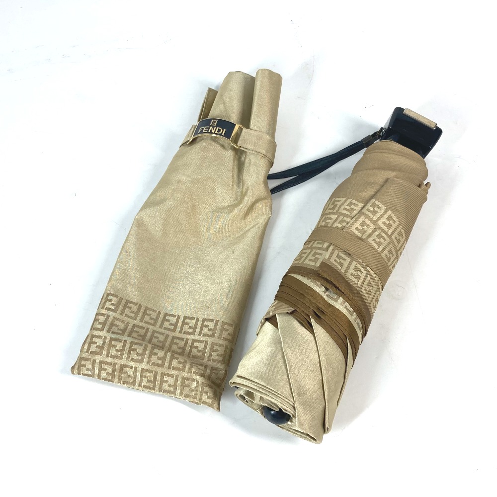 傘 折り畳み傘 ズッカ FF柄 アンブレラ ポーチ付き ポリエステル ベージュ 8,250円