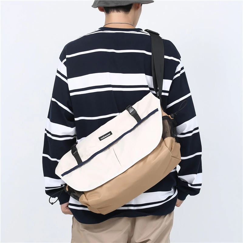 韓国斜めがけバッグメンズバッグ大容量シングルショルダーバッグ個性的郵便配達コンピュータバックパック