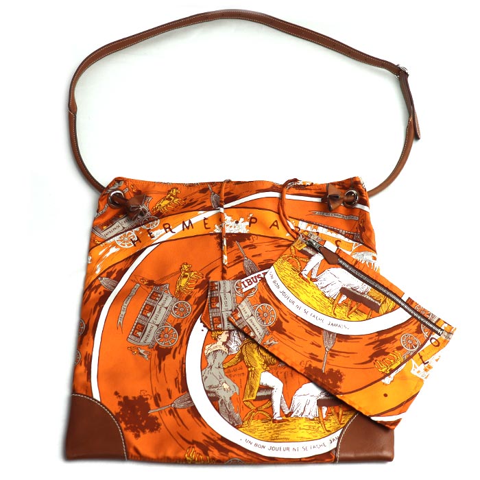 HERMES エルメス シルキーシティPM オムニバスと白い貴婦人のゲーム ショルダーバッグ オレンジ レディース BA ロL刻印 中古 59,988円