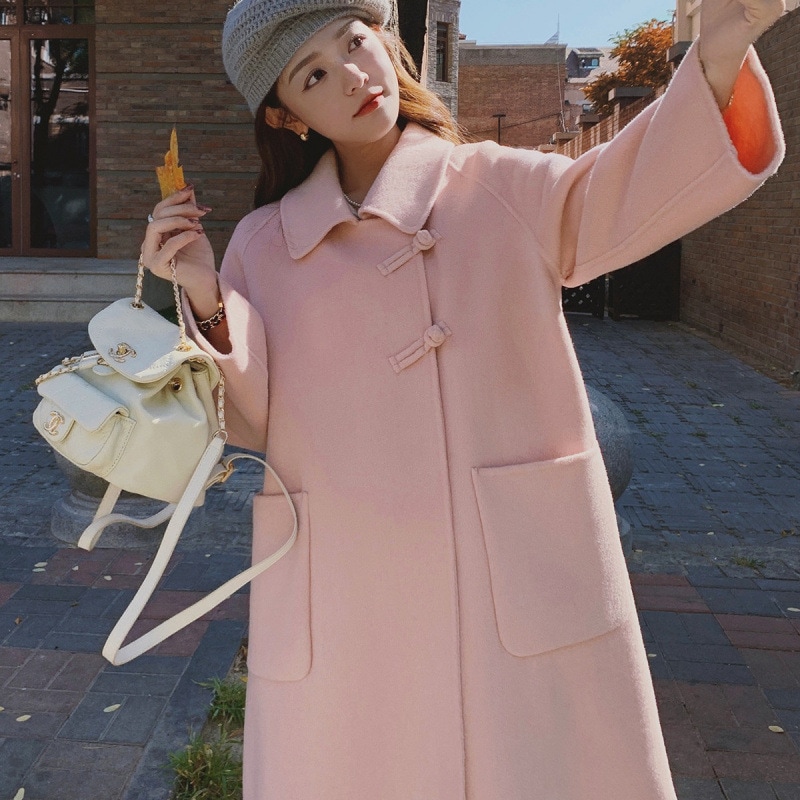 可愛いピンクの気質のラシャコート女性冬新型韓国ファッションAライン若見えトレンチコート