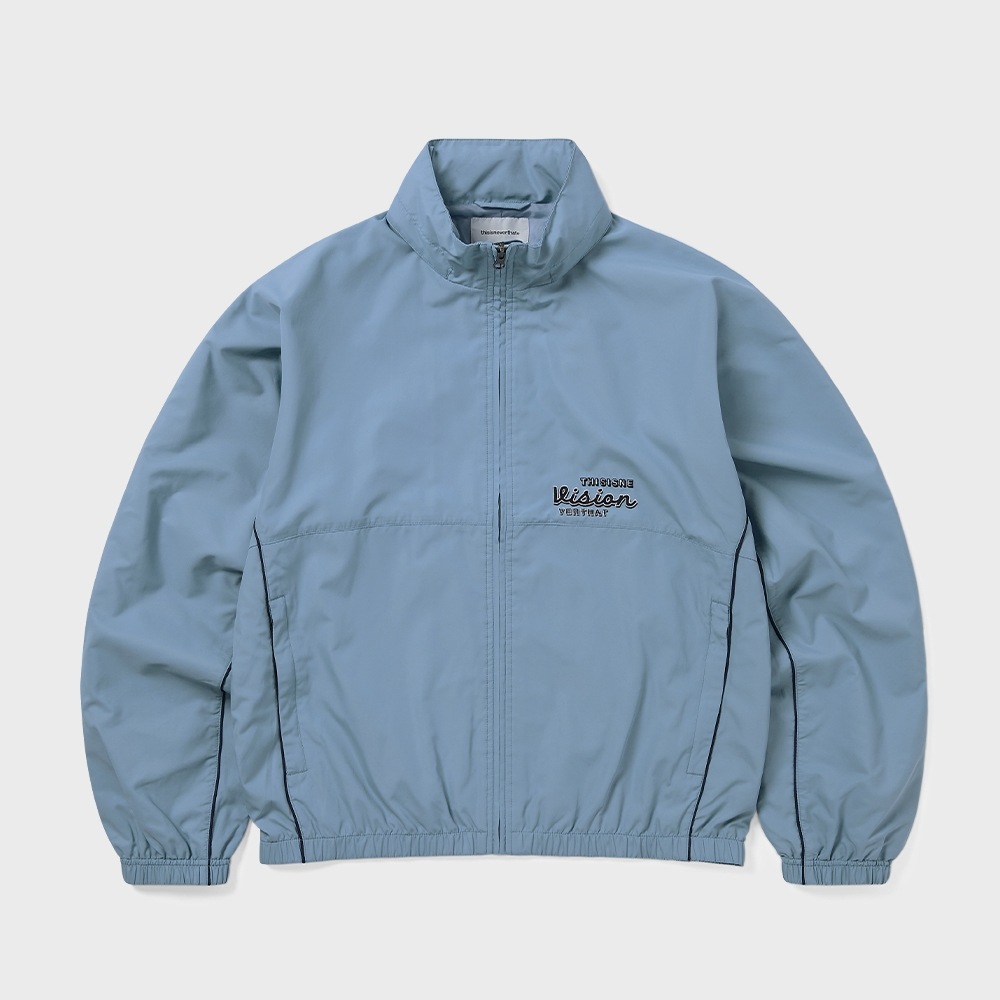 ディス・イズ・ネヴァー・ザットウォームアップジャケットブルー