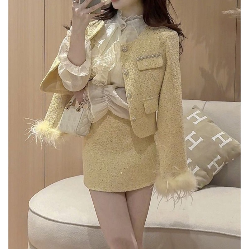 フレンチスタイルのシャネル風ツーピース女性用スーツファーの縁取りが施された袖口ツーピースデザインボディコンミニスカートが特徴です