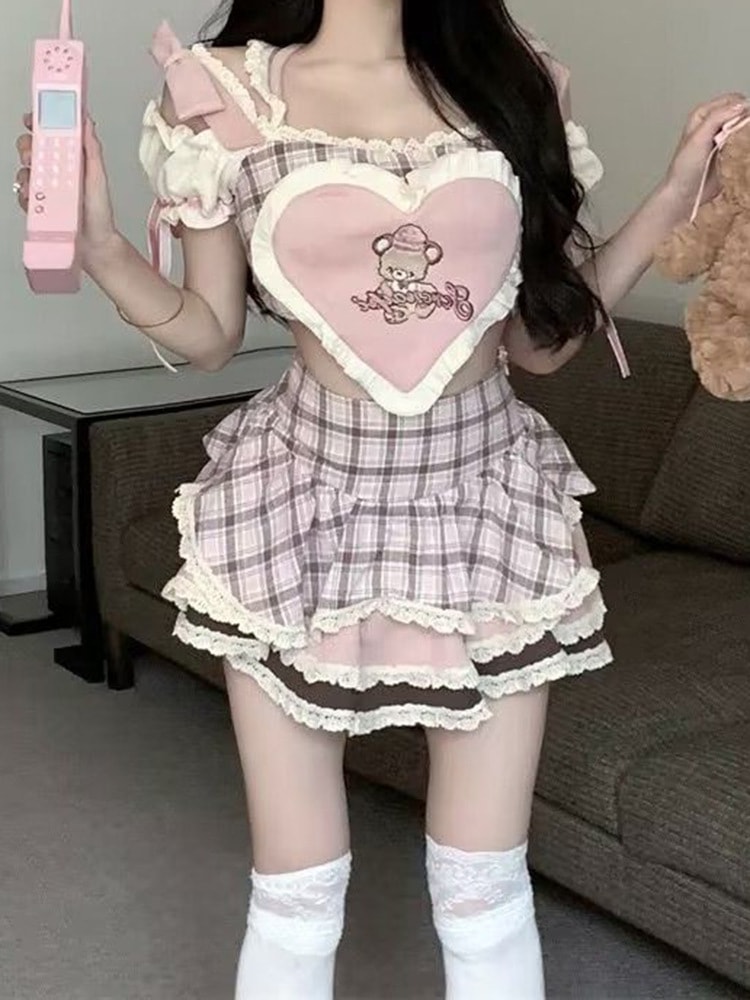 女性のための甘くてセクシーなチェック柄の夏のセットホルターネックのタンクトップスリムで若々しいショートスカートツーピースセット