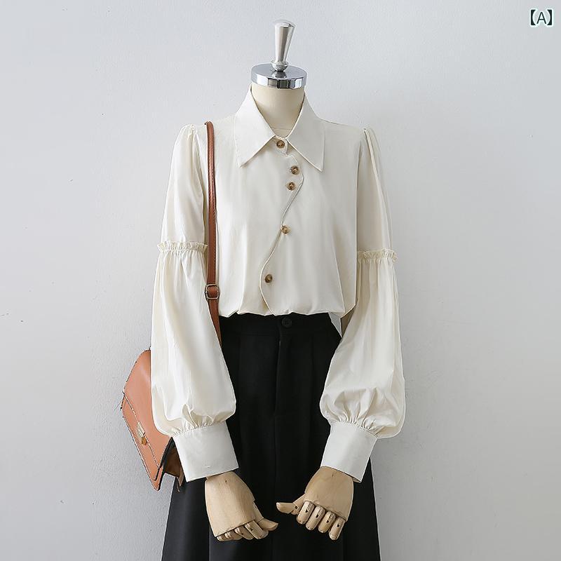 レディース シャツ ブラウス 長袖 春秋 アイボリー シャツ襟 ユニークボタン装飾 不規則カーブシングルブレスト アシメントリー フリルランタンスリーブ モード ナチュラル スタイリシュ エレガント