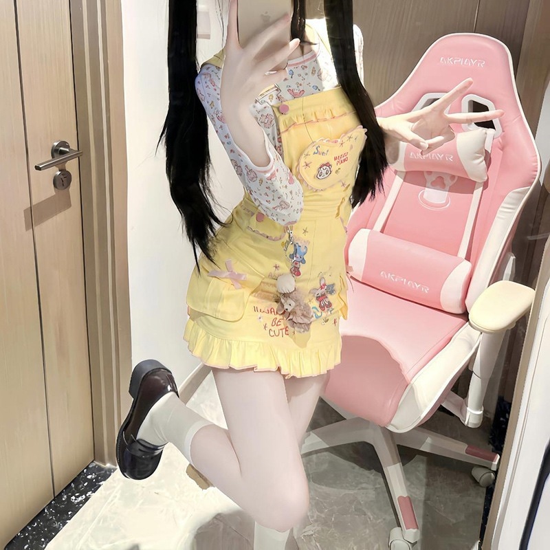 フィット感のあるプリントトップスとサスペンダードレスが特徴の春と秋向けの女性用和風若々しくスイートなツーピースセットです