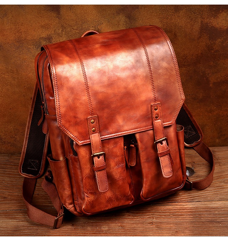 時間が復古して手革のリュックサック男性旅行包頭牛革のリュック青年のコンピュータを包みます