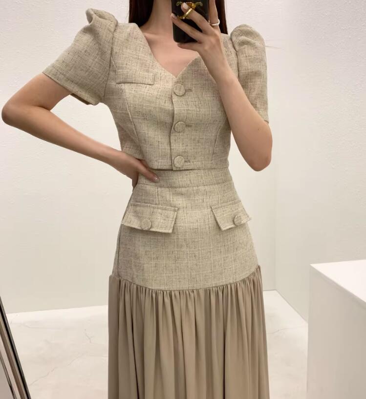 フランス風小香風v襟シングルボタンバブルスリーブ小スーツ+ぶつかり色半身スカートスーツ女の2着