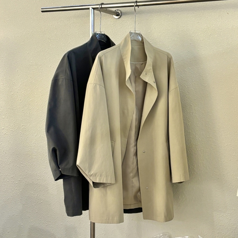 韓国スタイルのワークウェアスタンドアップカラールーズブレストカジュアルミッドレングスウインドブレーカー女性のための春と秋のハイエンド通勤コート