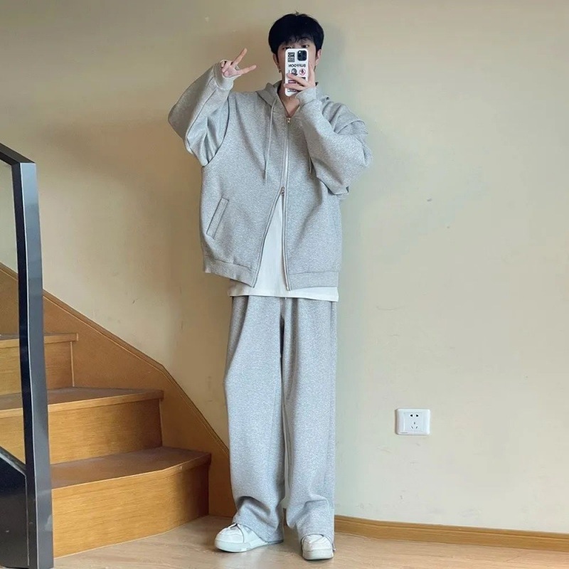 ルーズなデザインのカーディガンジャケットとワイドレッグパンツを組み合わせた男性用のハンサムカジュアルスポーツスーツとトレンディなツーピースセット