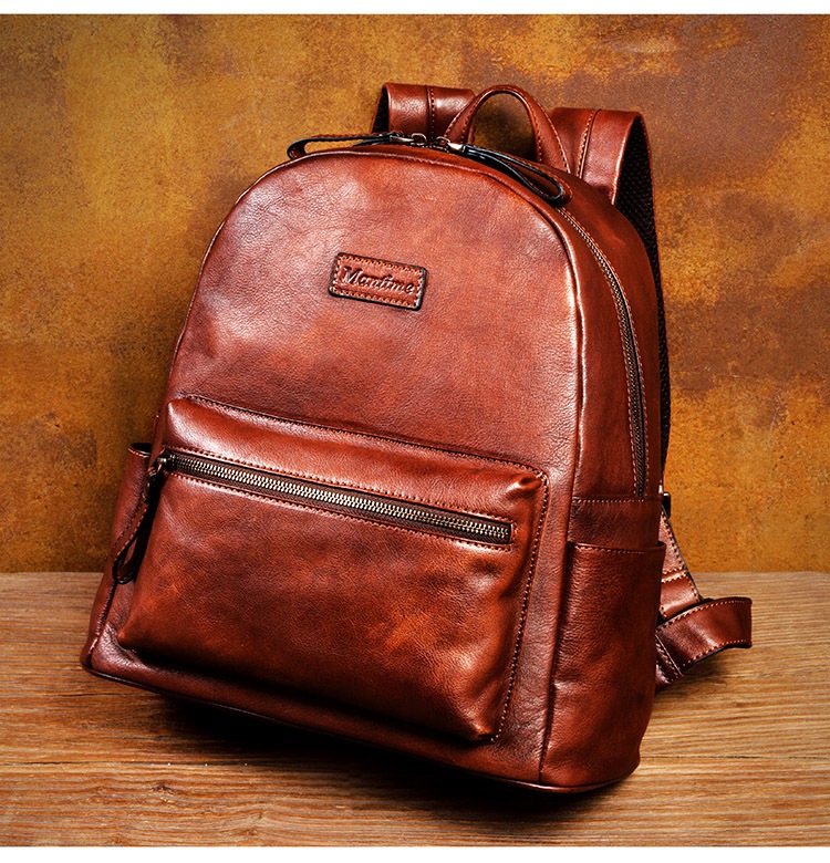 ゆっくり時間純手磨き色の真皮リュックサック男女款復古頭層植なめし牛革ランドセルレジャー旅行