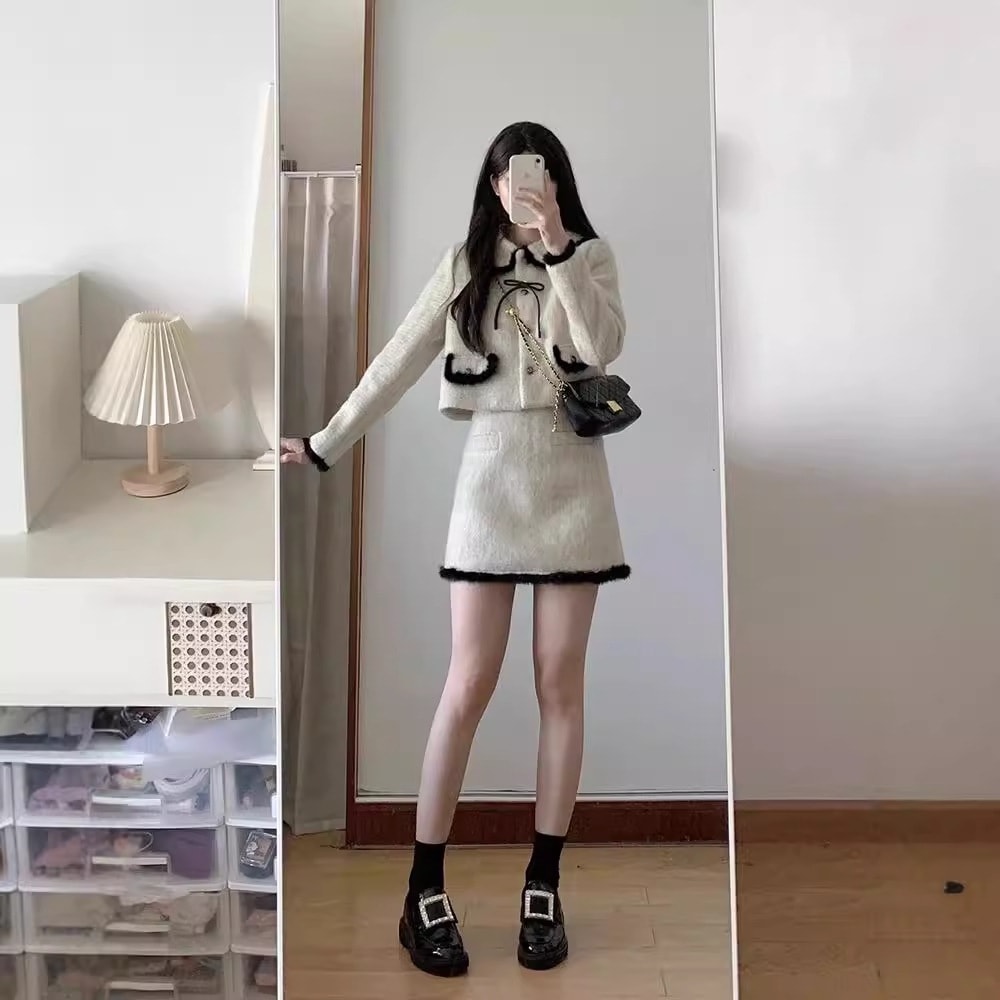 ハイエンドのカスタマイズ-女性用ファッションスーツ秋冬韓国語版コントラストラペルジャケット女性+ハイウエストAラインスカートヒップカバースカート2点セット