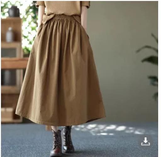 スキンスカートソリッドカラー2023春と夏の新しいルーズウエストルーズカジュアルな文学