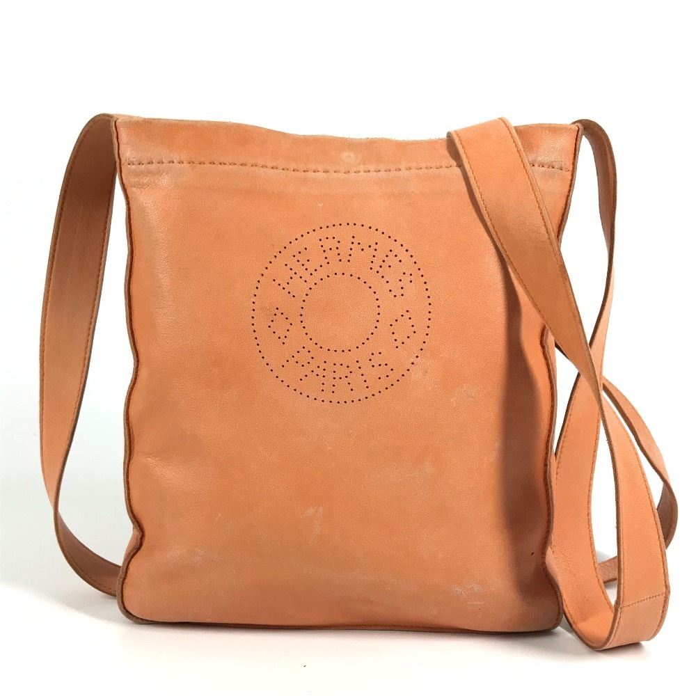 ショルダーバッグ クルードセル ロゴ パンチングロゴ 斜め掛け カバン ポシェット レザー オレンジ