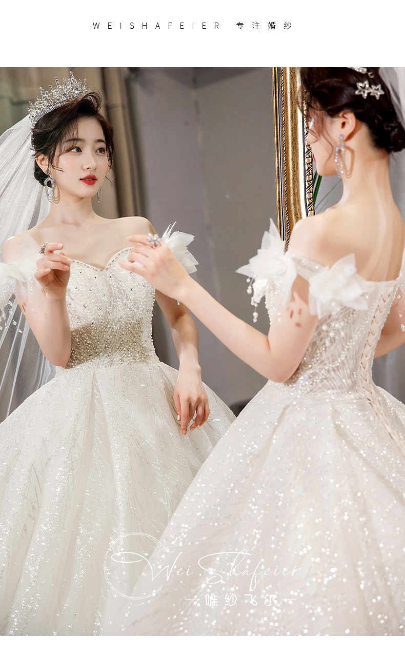 結婚式のメインヤーン新婦ワンショルダービッグテール高級重工業小男