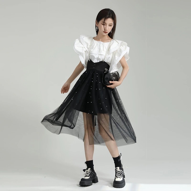 脚魅せミニスカートスカートをつなぎ合わせて腰の中の長い腰に黒い糸のスカートひんやりボトムス 6,863円