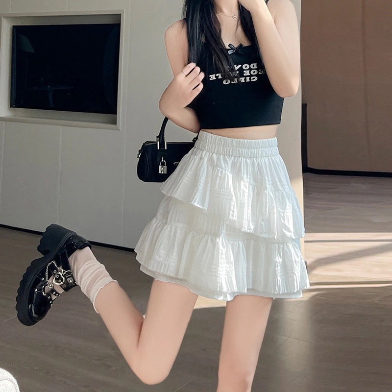 【1つ買うと10つ無料】2025年夏の女性のための白い不規則なケーキスカート小さな ラインスカートとスリムスカート