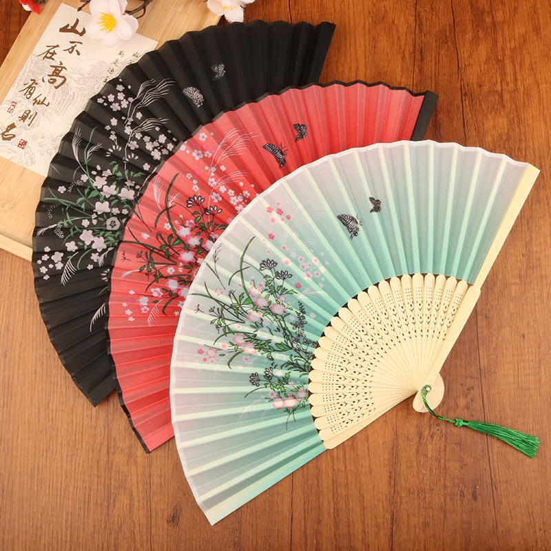 【1点ご購入 で10点プレゼントいたします】扇子の扇子の中にフリンジの女性の折りたたみ古典古代夏の黒い竹の扇子