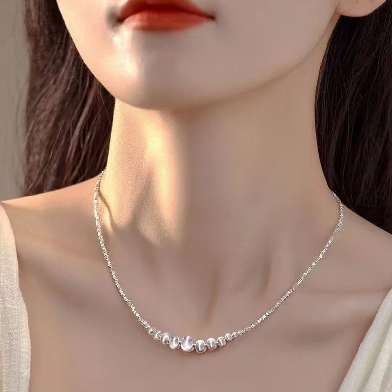 数タエルのシルバーを使用したスターリングシルバーのネックレスミニマリストで控えめな高級スタイルグラデーションのキャットアイ効果とファッショナブルでエレガントな外観が特徴です