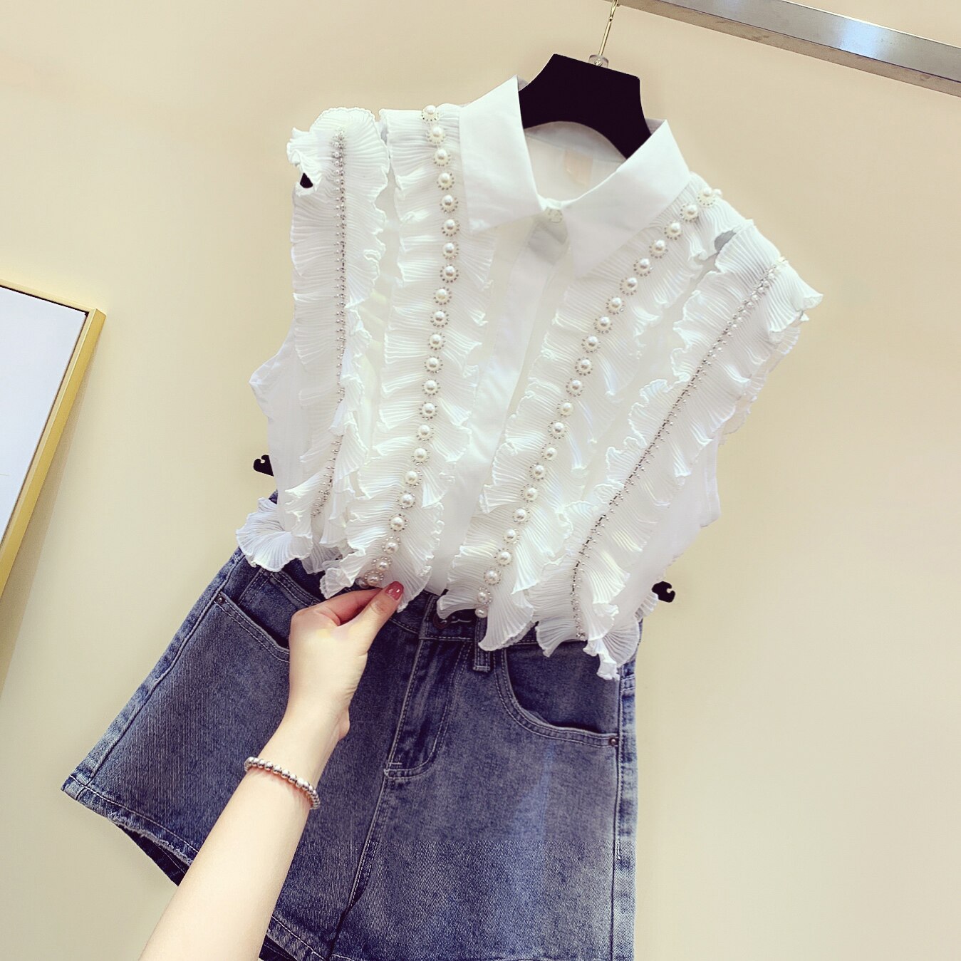 2色 トップス シャツ ブラウス カットソー レディース 春夏 かわいい ゆったり ゆったり 袖なし ノースリーブ 襟付き ポロカラー ドッキング シフォン フリル 前開き 透け感 シースルー パール