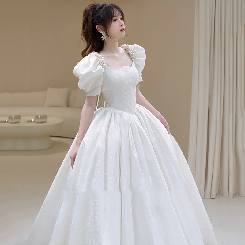 白い婚約イブニングドレス高級な贅沢ニッチなスタイル成人式のプリンセスの乾杯ドレス舞踏会のガウン宴会のホステス