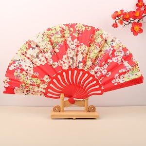 【1点ご購入 で10点プレゼントいたします】婦人扇呉服曲げ刀透かし彫りプラスチック花柱折りたたみ布扇子小学生扇子