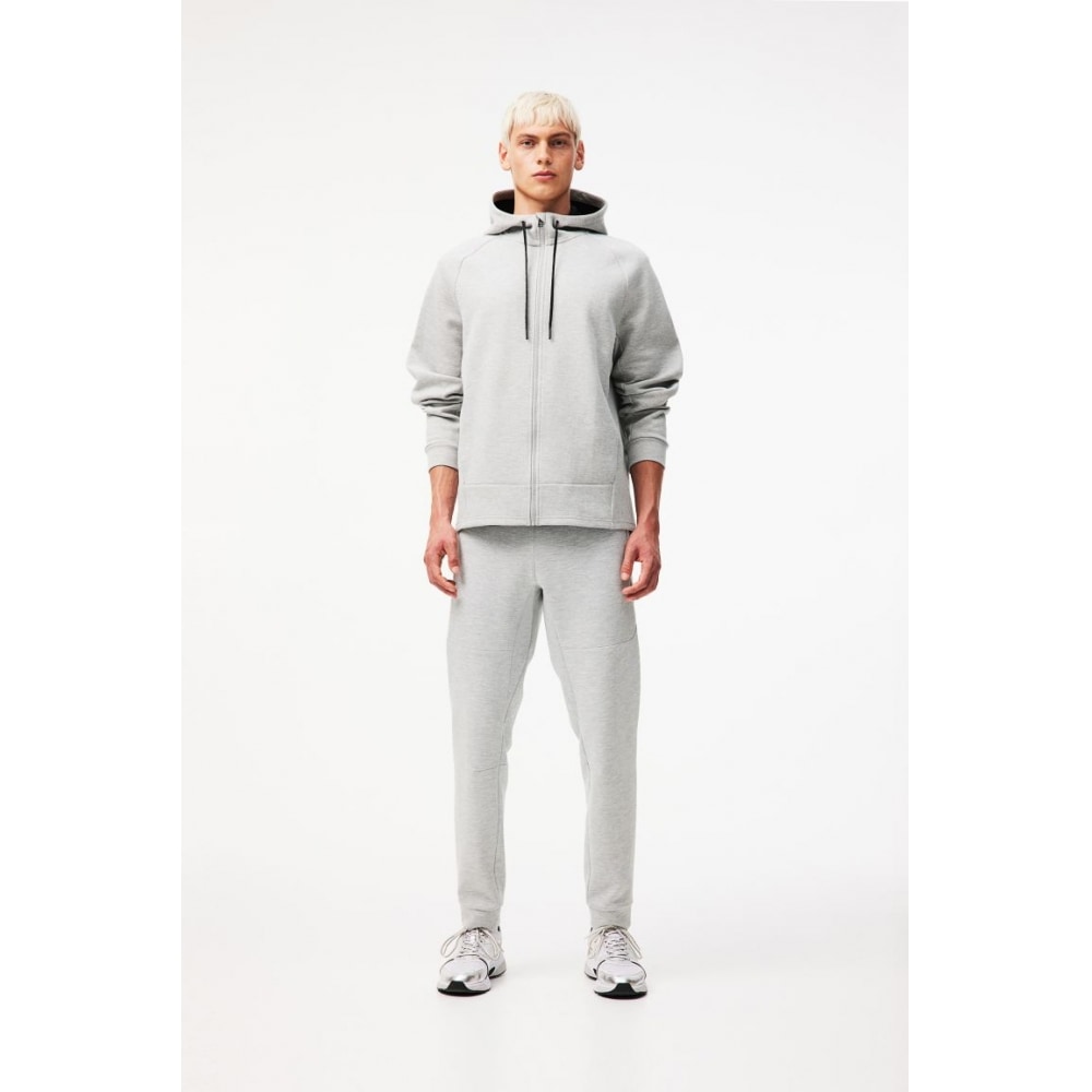 H&M DryMove ジップポケットディテールテーパードテックジョガーパンツライトグレーメランジ