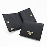 Qoo10] PRADA 【中古】 長財布 スタッズ ビジュー ラ