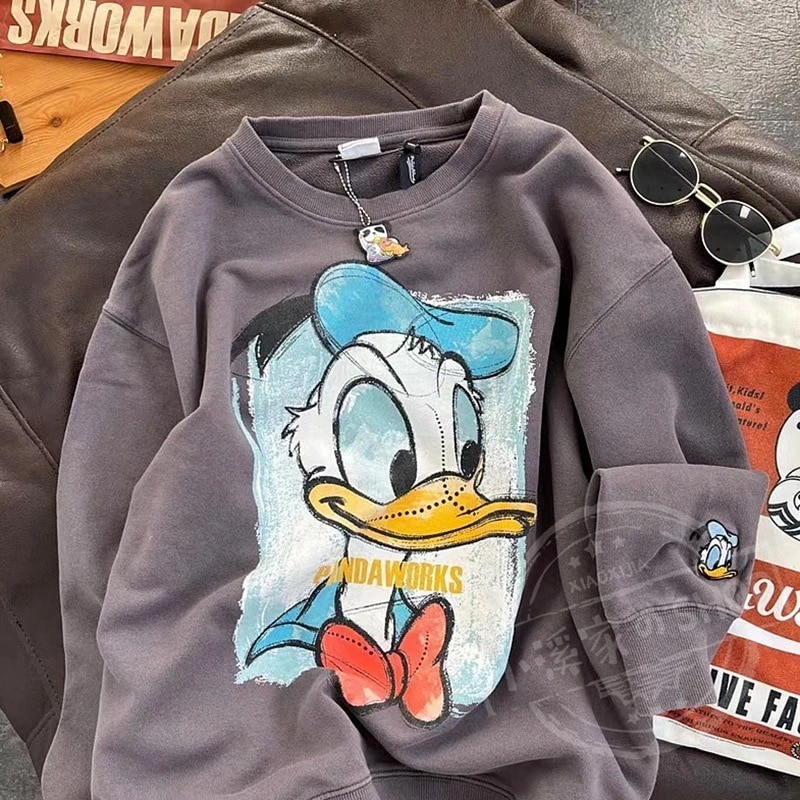 春秋アメリカンレトロ男女カップルトップスかわいいドダックスウェットシャツ韓国風カジュアル