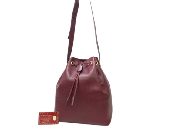 カルティエ ショルダーバッグ マストライン レザー - 巾着 ゴールド金具 ボルドー ハンドバッグ ショッピングバッグ クロスボディバッグ 鞄 ブランド 斜め掛け 肩掛け【本物保証】