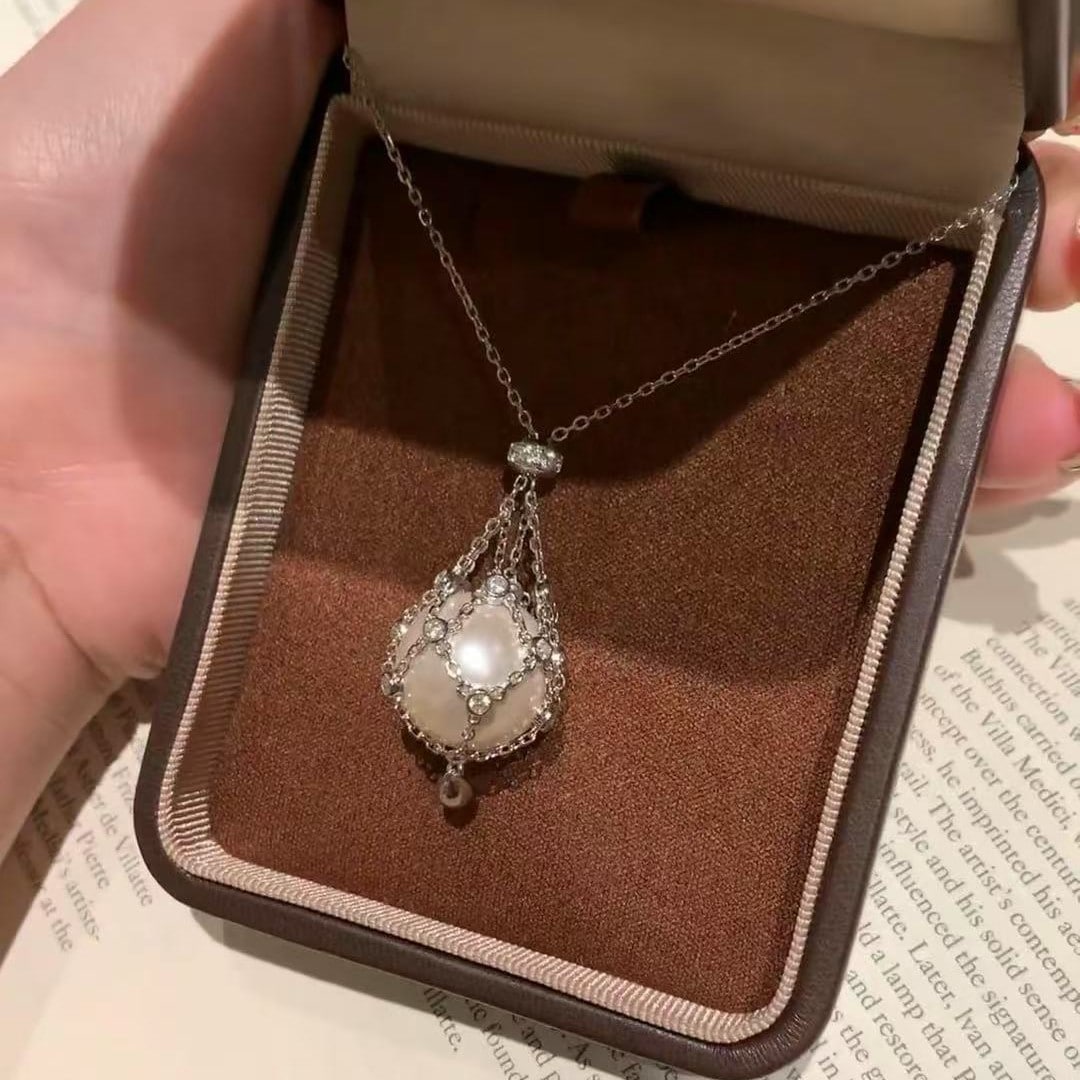 ネットシェイプのパールネックレスS925 スターリングシルバーケージドパールヴィンテージファッションニッチ軽い高級感エレガントなスターリングシルバーのセーターチェーン