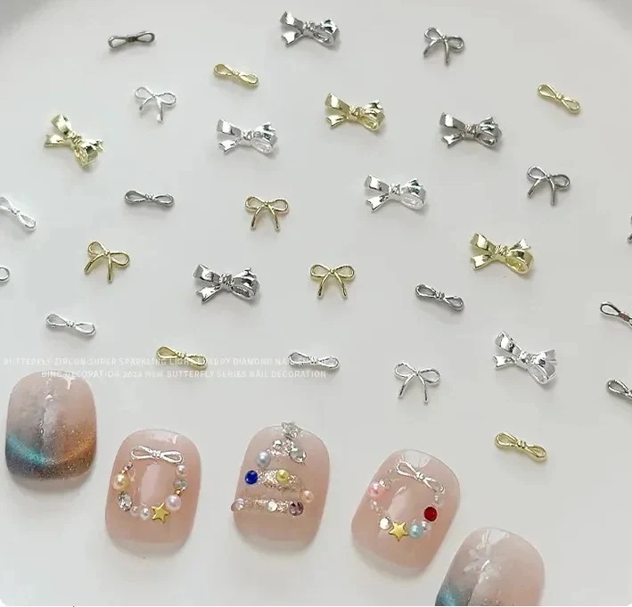 【10点セット】ゴールドとシルバーのリボン シンプルで光沢のある金属合金 ネイルアートの装飾 マニキュアデザイン パーツ チャーム 30個