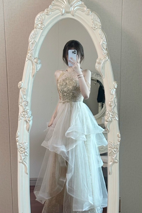 金法小衆軽豪華蓬蓬スカートシャンパン色の雰囲気が優雅で高級感があります