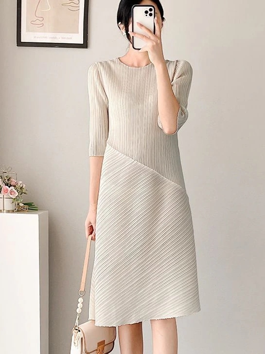 三宅雰囲気ワンピースミディアム丈ゆったり薄手不規則デザイン感オーバーサイズプリーツスカート対外貿易婦人服