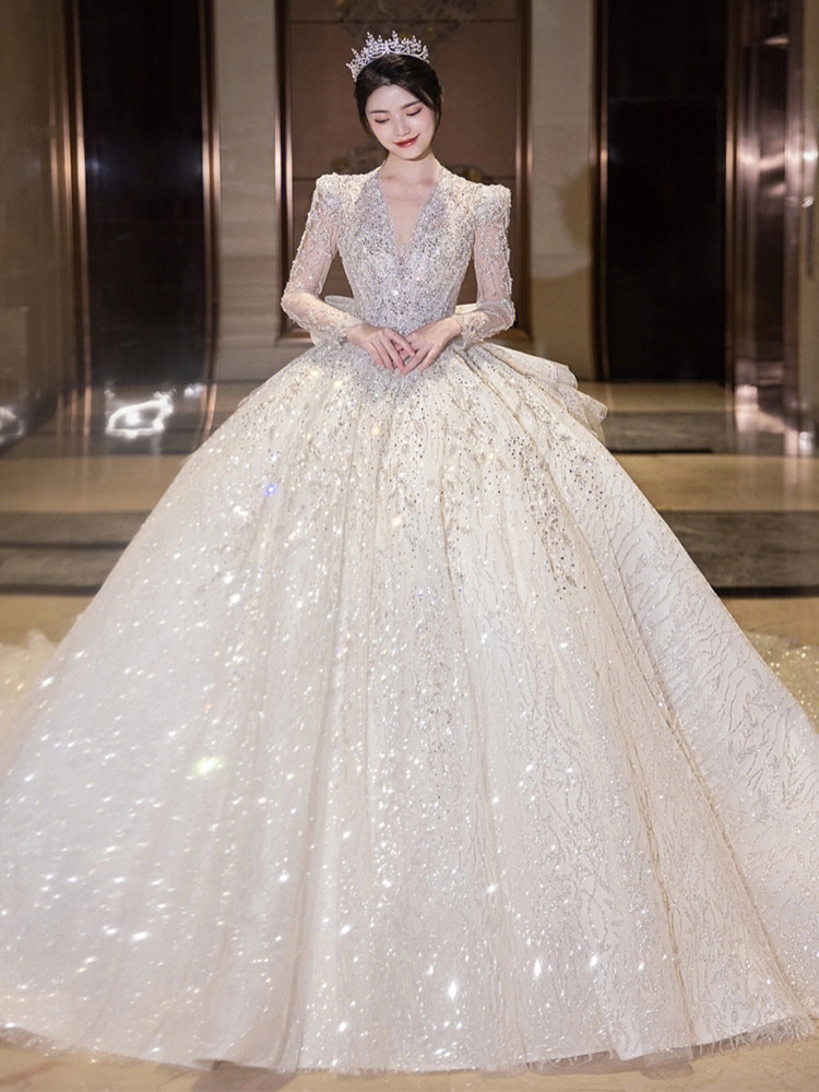 ウェディングドレス 袖あり 立ち襟 スパンコール キラキラ 素敵 キレイめ 花嫁ドレス 結婚式ドレス トレーンドレス バックリボン オシャレ 海外挙式 披露宴