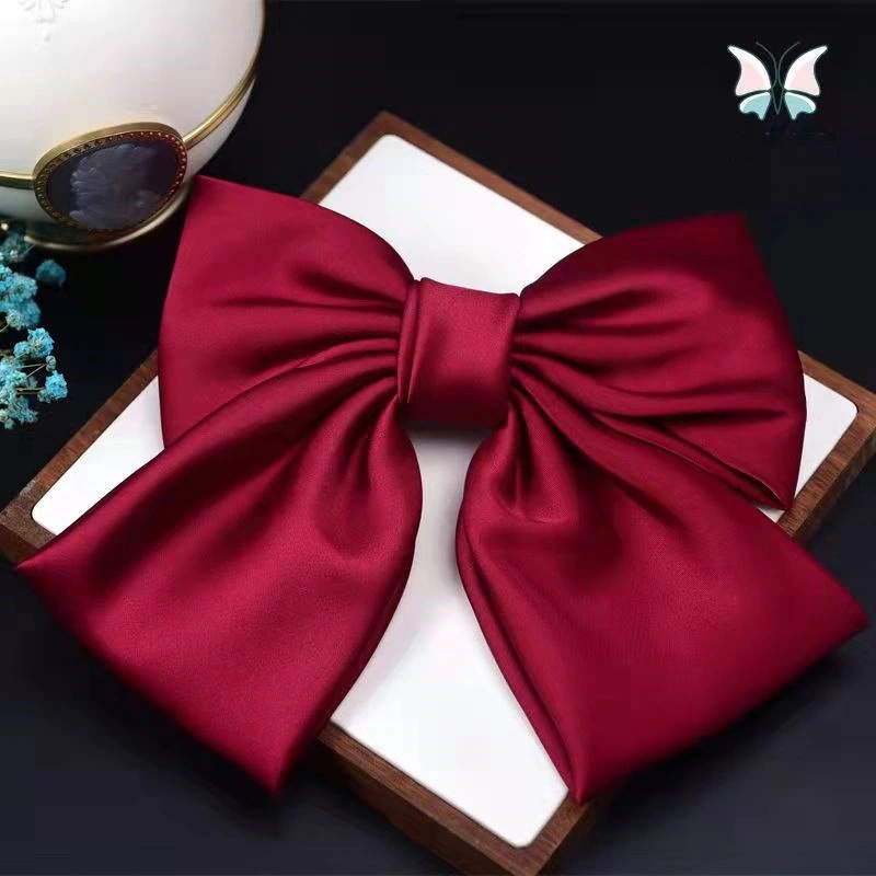 大きな弓のヘアピンを持つ女の子韓国ファッション