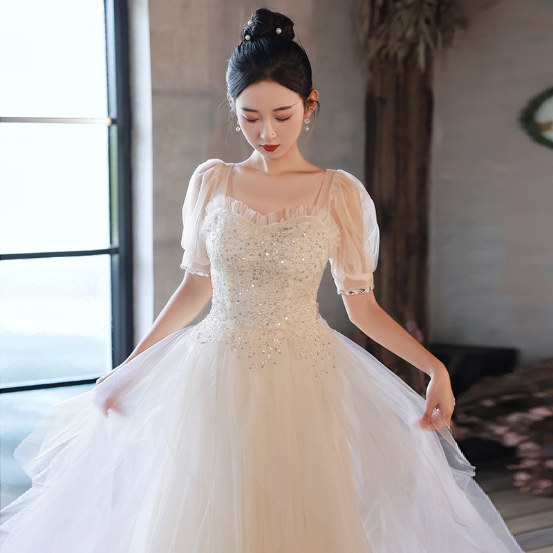 シャンパンカラーのイブニングドレス軽い高級高級2025年新作フランスの婚約証明書付き軽いドレスは普段着としても着用できます