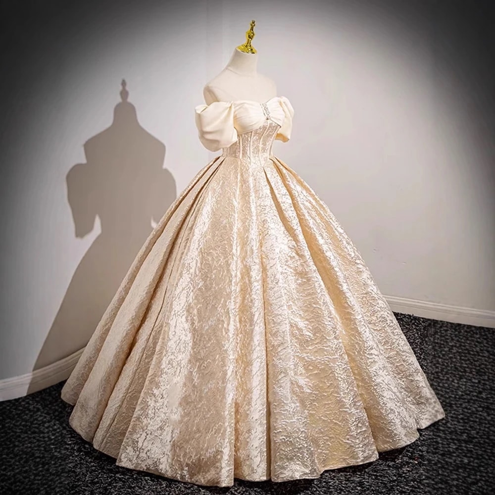 シャンパンカラーのフレンチスタイルのエンゲージメントとトーストドレス花嫁のための新しい高級プリンセスドレス成人式