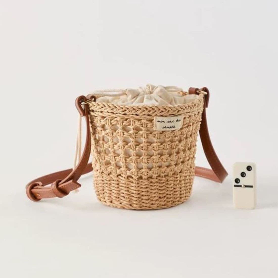 ころんとしたフォルムがかわいいショルダーバッグ 鞄 斜めがけ ストラップ ファッション雑貨 かごバッグ 夏 かご素材 ナチュラル 大人かわいい 可愛い 巾着 お出かけ スマホ 小物 カジュ 5,415円