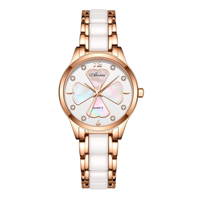 新商品の亜プラチナ腕時計の女性幸運四葉草にダイヤモンドの陶磁器の石英の女性時計の薄い女性の小さい文字板の腕時計を入れます
